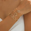Wholesale Alloy Electroplated Exaggerated Geometric Hollow Fourleaf Clover Bracelet And Adjustable Ring Set For Women