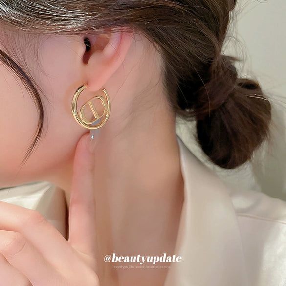 Wholesale Alloy Fashion Ol Letter Heart Earrings With Electroplating