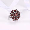 Wholesale Alloy Flower Geometric Ring For Women With Electroplating Treatment And Garnet Red Zircon