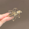 Wholesale Alloy Flower Hollow Electroplated Women's Brooch Fashion Elegant Suit Shirt Accessories Pin