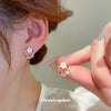 Wholesale Alloy Flower Patterned Diamond Treated Silver Needle Hollow Pearl Earrings For Women Simple Fresh Sweet And Personalized