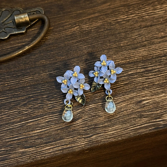 Wholesale Alloy Flower Shape Electroplated Silver Needle Flower Leaves Tassel Earrings For Women Fashion Retro High End