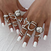 Wholesale Alloy Geometric Asymmetrical Water Drop Hug Ring With Electroplating For Women