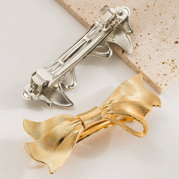 Wholesale Alloy Geometric Bow Hairpin For Women With Electroplating Treatment