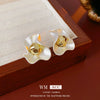 Wholesale Alloy Geometric Electroplated Pleated Round Earrings For Women Highend Cold Style