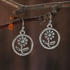 Wholesale Alloy Geometric Oval Spiral Hollow Pendant Earrings For Women Electroplated Retro Bohemian Style