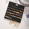 Wholesale Alloy Geometric Tassel Pearl Love Feather Earrings For Women With Electroplating