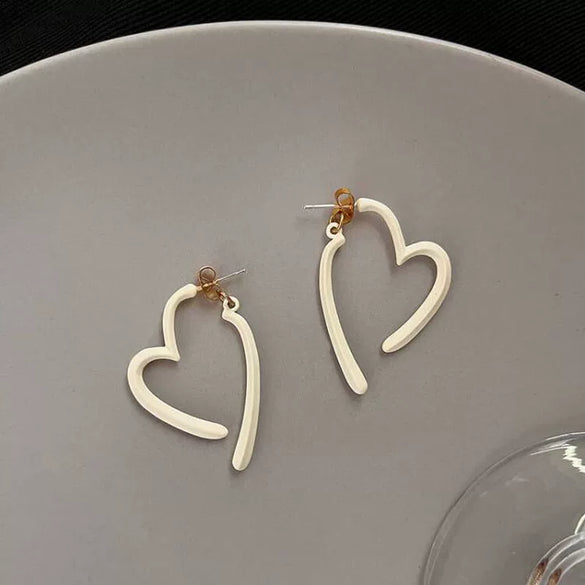Wholesale Alloy Heart Shape Light Luxury Style Earrings With Electroplating Treatment For Women