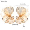 Wholesale Alloy Hollow Flower Earrings With Electroplating For Women Creative And Sweet Design