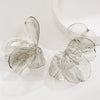 Wholesale Alloy Hollow Flower Earrings With Electroplating For Women Creative And Sweet Design