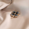 Wholesale Alloy Imitation Crystal Fourleaf Clover Brooch Women's Minimalist Light Luxury Electroplated Suit Coat Accessory
