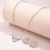 Wholesale Alloy Love Heart Water Drop Bell Pattern Hollow Earrings Necklace Jewelry Suit For Women With Electroplating Treatment