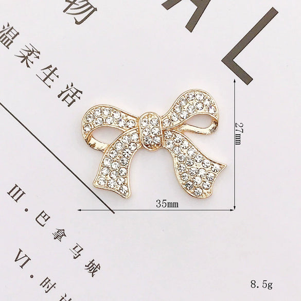 Wholesale Alloy Mobile Phone Shell Jewelry Accessories With Pearl Bow And Electroplating Treatment