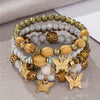Wholesale Alloy Multilayer Wooden Beaded Bohemian Style Bracelet With Butterfly Pendant And Electroplating Treatment