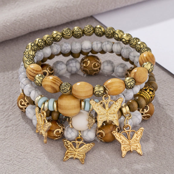 Wholesale Alloy Multilayer Wooden Beaded Bohemian Style Bracelet With Butterfly Pendant And Electroplating Treatment