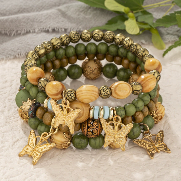 Wholesale Alloy Multilayer Wooden Beaded Bohemian Style Bracelet With Butterfly Pendant And Electroplating Treatment