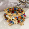 Wholesale Alloy Multilayer Wooden Beaded Bohemian Style Bracelet With Butterfly Pendant And Electroplating Treatment