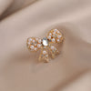 Wholesale Alloy Pearl Bow Antirunning Light Brooch For Women Electroplated Minimalist Style Collar Pin Corsage Accessory