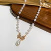Wholesale Alloy Pearl Necklace With Diamondencrusted Bow Pendant Electroplated Women's Retro Fashion