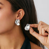 Wholesale Alloy Pleated Geometric Cut Out Spiral Flower Design Electroplated Women's Earrings