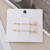 Wholesale Alloy Princess Style Planet Pearl Moon Snowflake Flower One Word Clip Hairpin With Electroplating