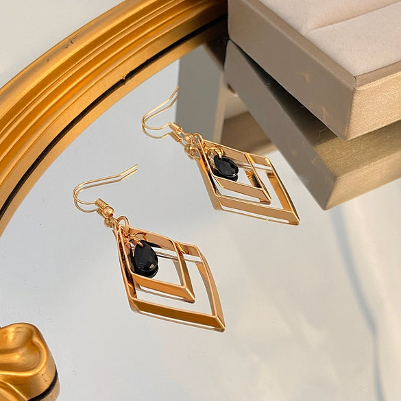 Wholesale Alloy Retro Diamond Geometric Black Water Drop Hollow Rhinestone Women's Earrings With Electroplating