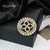 Wholesale Alloy Rhinestone Bow Brooch With Fixed Antiwalking Pin And Electroplating Design