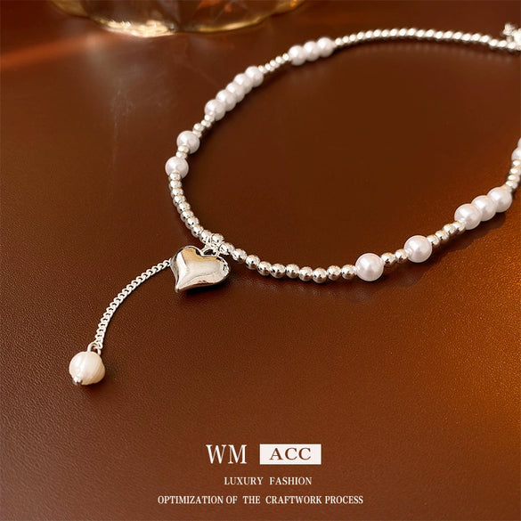 Wholesale Alloy Silver Heart Pearl Clavicle Chain Necklace For Women With Electroplating