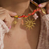 Wholesale Ancient Style Orange Printed Headscarf With Stainless Steel Electroplated Sun And Moon Pendant Jewelry For Women