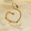 Wholesale Asymmetrical Pearl Heart Pendant Titanium Steel Bracelet For Women With Electroplating Design