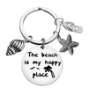 Wholesale Beach Stainless Steel Keychain With Starfish And Conch Design