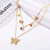 Wholesale Bohemian Fashion Alloy Butterfly Pendant Double Layer Necklace With Water Wave Chain And Geometric Pattern Electroplated