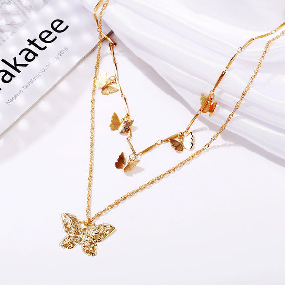 Wholesale Bohemian Fashion Alloy Butterfly Pendant Double Layer Necklace With Water Wave Chain And Geometric Pattern Electroplated