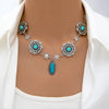 Wholesale Bohemian Style Turquoise Flower Pendant Alloy Necklace With Electroplating For Women