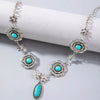 Wholesale Bohemian Style Turquoise Flower Pendant Alloy Necklace With Electroplating For Women