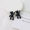 Wholesale Cartoon Raise Hand Bear Pendant Necklace Bracelet Alloy Accessories With Plating And Painting