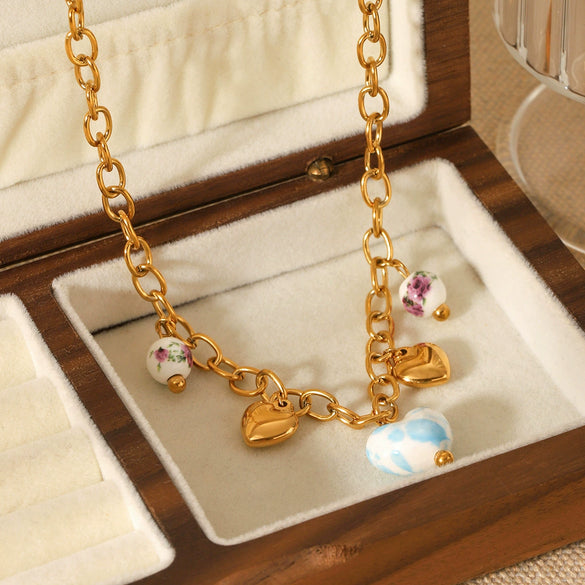 Wholesale Ceramic And Stainless Steel Heartshaped Tassel Necklace With Geometric Pattern And Electroplating For Women