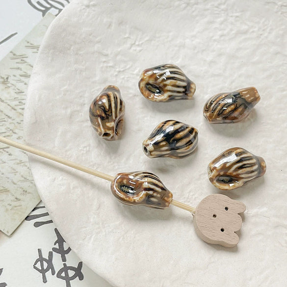 Wholesale Ceramic Conch Pattern Loose Beads For Handmade Jewelry Retro Style With High Temperature Flower Glaze And Paint Treatment