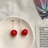 Wholesale Cherry Petal And Cherry Fruit Stud Earrings Made Of Alloy With Dripping Oil
