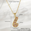 Wholesale Christmas Series Copper 18K Goldplated Pendant Necklace With Christmas Tree Snowman Socks Hat Scepter Light Luxury Style O Word Chain Unisex