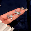 Wholesale Copper Bow Zircon Inlaid Women's Earrings