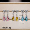 Wholesale Copper Drop Pear Shaped Flower Simulation Diamond Earrings