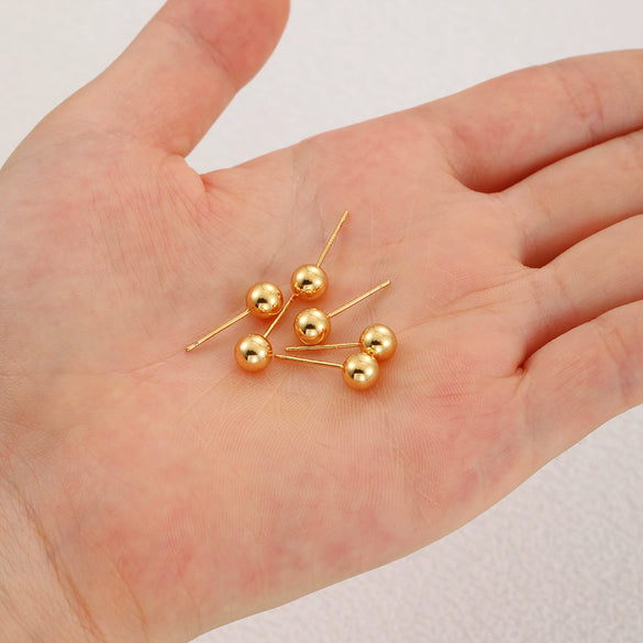 Wholesale Copper Earrings With Small Gold Bean Shape And Real Gold Plated Simple Style