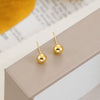Wholesale Copper Earrings With Small Gold Bean Shape And Real Gold Plated Simple Style