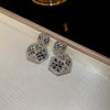 Wholesale Copper Flower Hollow Earrings Electroplated For Women Niche Creative Light Luxury High Grade