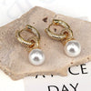 Wholesale Copper Geometric Ball Pendant Ear Clip Earrings For Women With Electroplating And Zirconium Pearl Retro Elegant Style