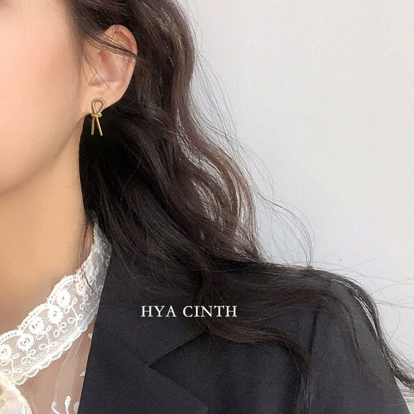 Wholesale Copper Geometric Bow Knot Twisted Matte Electroplated Earrings For Women