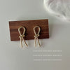 Wholesale Copper Geometric Bow Knot Twisted Matte Electroplated Earrings For Women