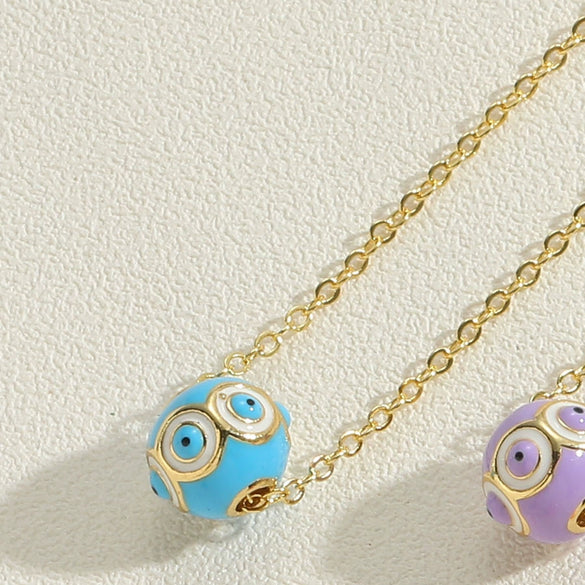Wholesale Copper Geometric Hollow Round Eye Pendant Necklace With Electroplating And Mixed Gemstone Setting For Women