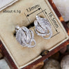 Wholesale Copper Geometric Line Winding Earrings Inlaid With Zircon For Women